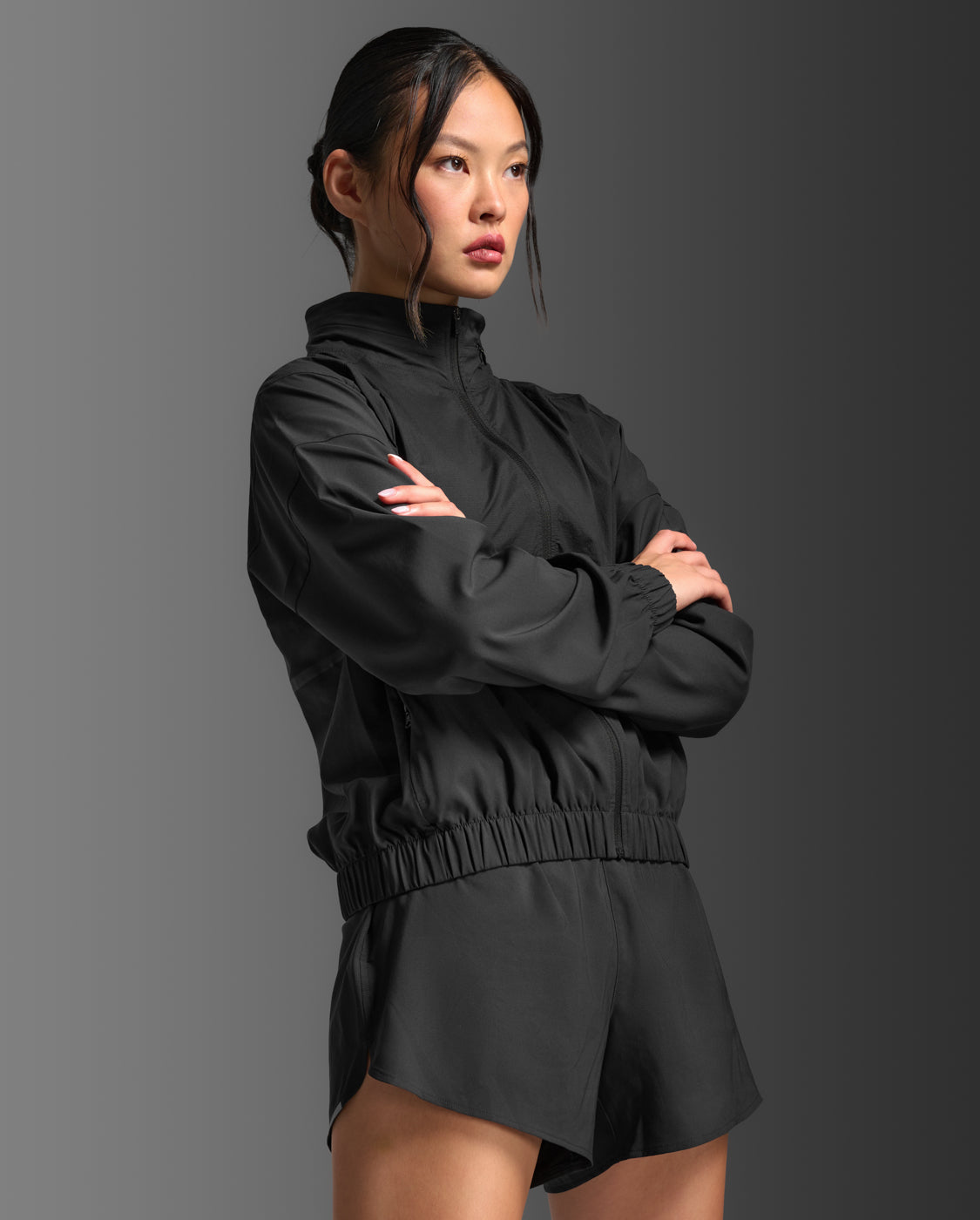W Aero Sheer Windbreaker 女士 暢跑連帽防風防潑水機能外套 | 黑