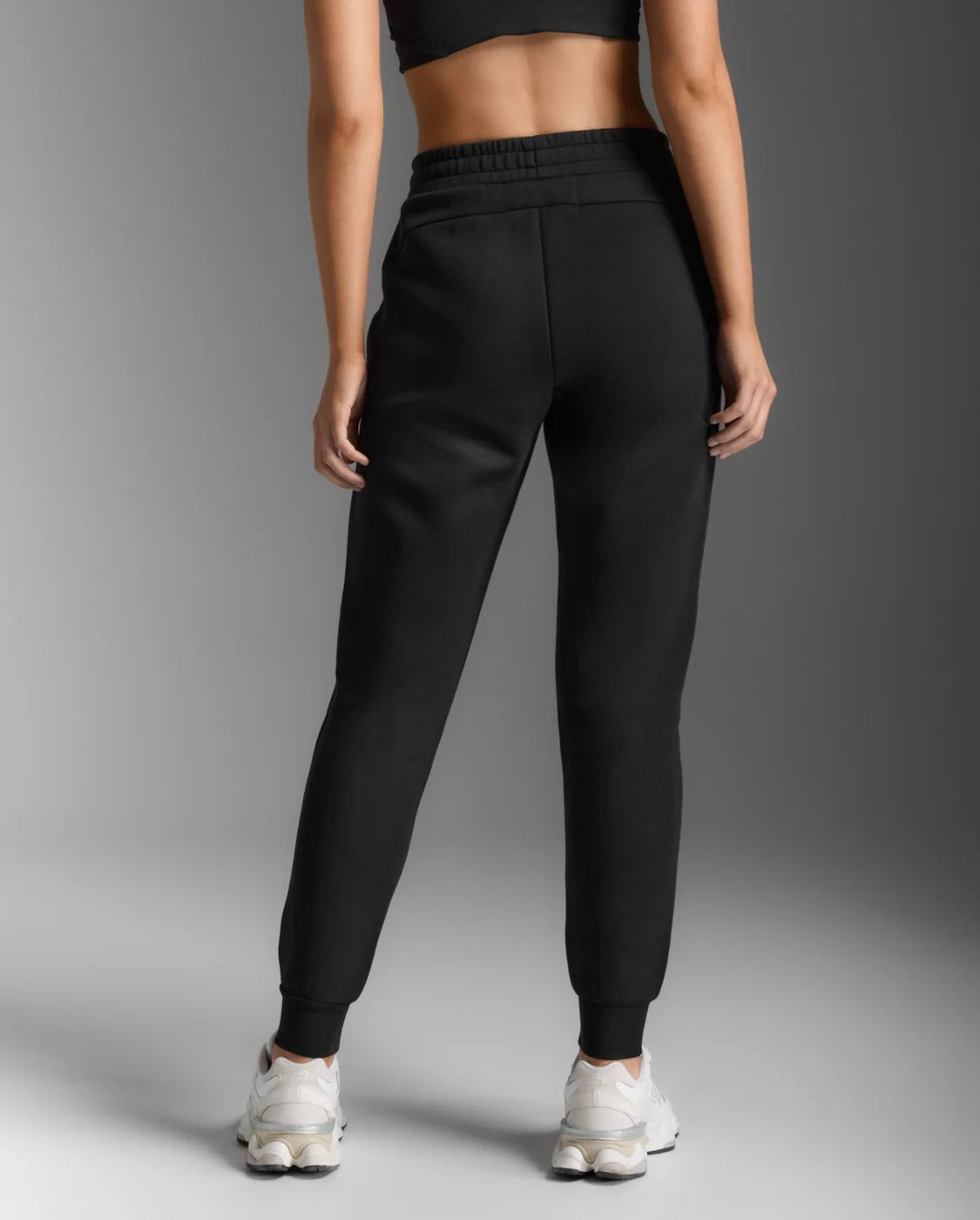 W Commute SmoothSpacer Trackpant 女士 通勤輕柔抽繩腰保暖運動長褲|黑