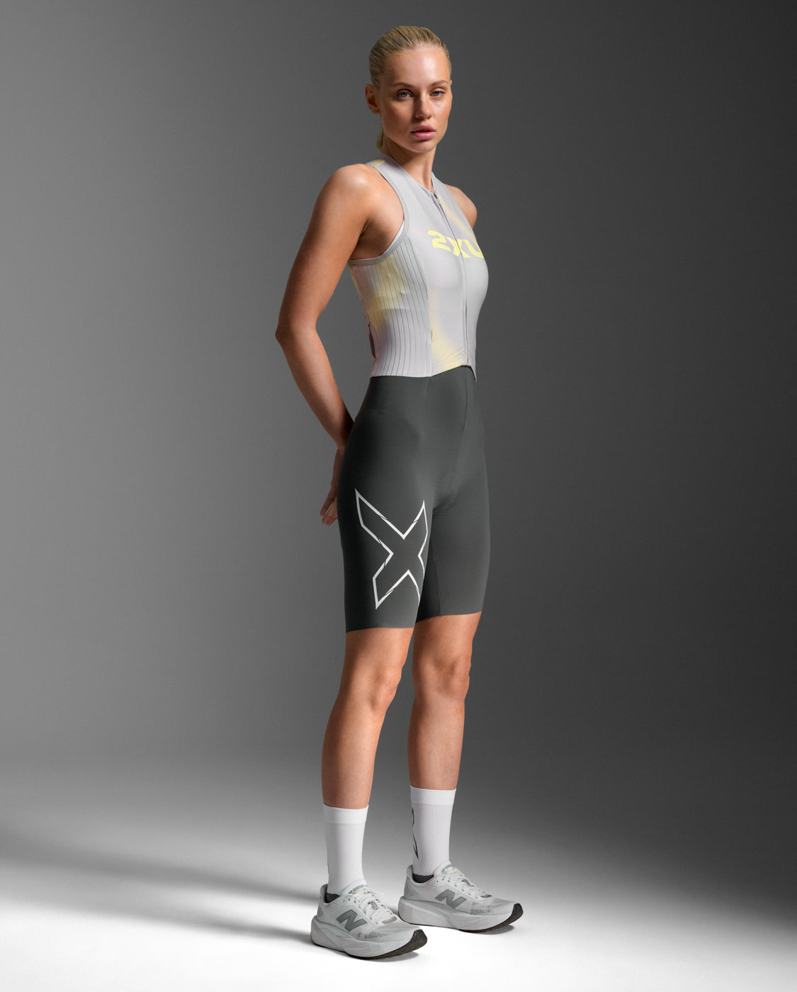 Light Speed React Trisuit 女士 輕盈奔馳進階選手實戰無袖連體三鐵衣｜檸檬黃／深灰藍