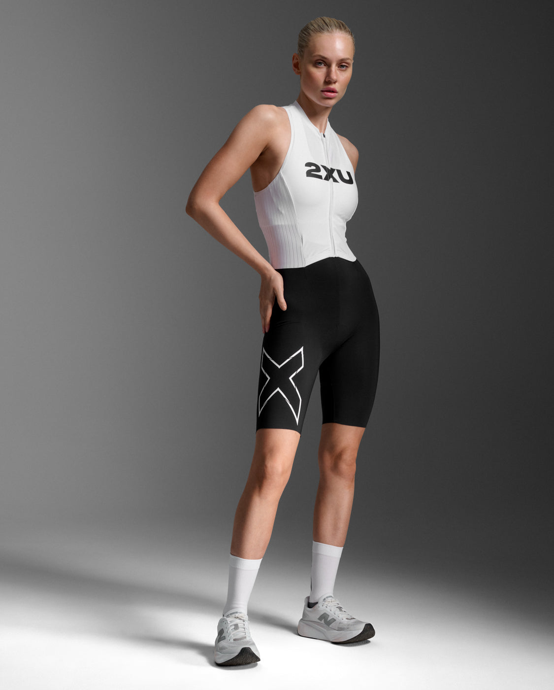 Light Speed React Trisuit 女士 輕盈奔馳進階選手實戰無袖連體三鐵衣｜白/黑